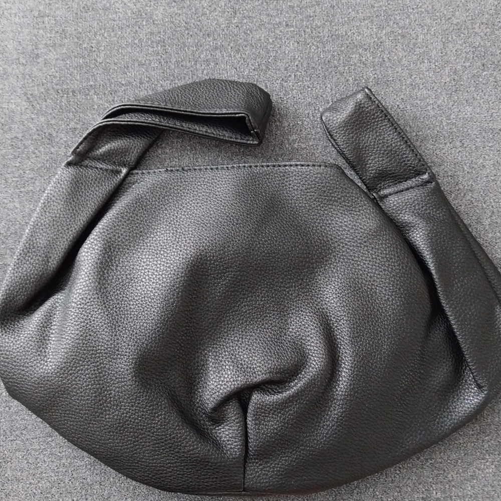 NWT wrist carry all  purse.